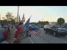 Supporters greet Trump's motorcade upon arrival in Florida