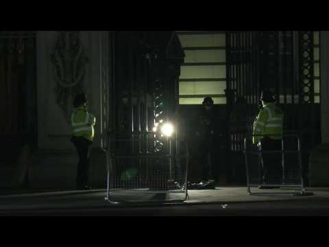 Policemen outside Buckingham Palace following arrest