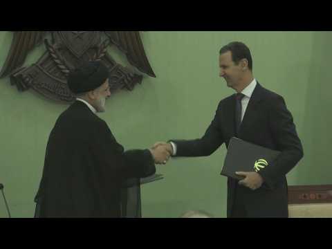 Iran's Raisi signs agreements with Syria's Assad on landmark visit