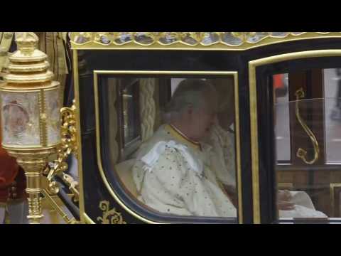 King Charles III and Camilla travel down The Mall in procession to coronation