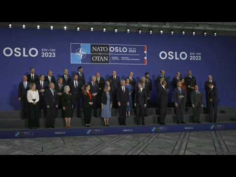 NATO foreign ministers pose for a group photo at Oslo meeting