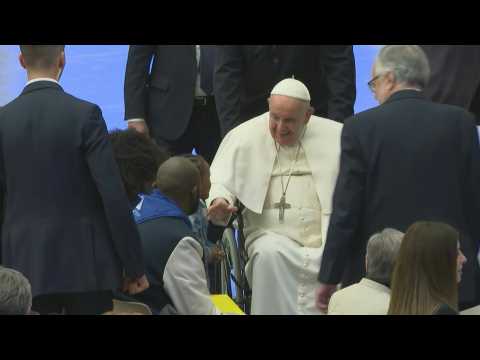 Pope greets refugees helped through Christian 'corridors'
