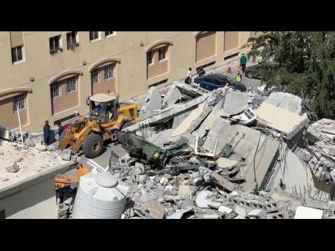 Rescuers gather at site of collapsed building in Qatar