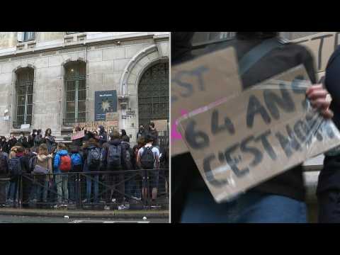 Students block entrance to Paris high school to protest pension reform
