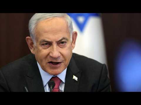 Israelis take to the street after MPs pass law protecting Netanyahu