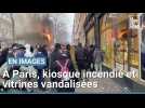 À Paris, des images impressionnantes d'un kiosque incendié et de vitrines vandalisées