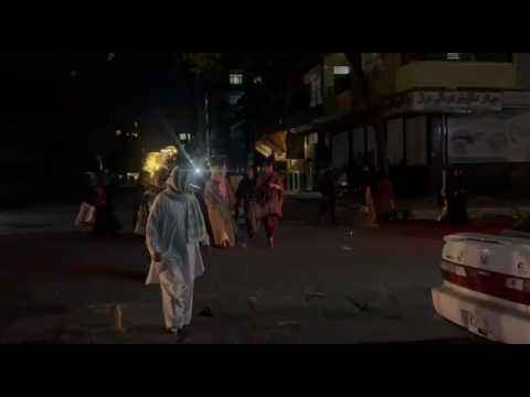 People stand in streets in Kabul after strong quake jolts Afghanistan