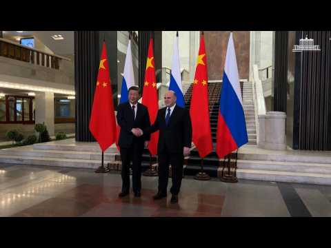 President Xi meets Russian PM ahead of talks with Putin
