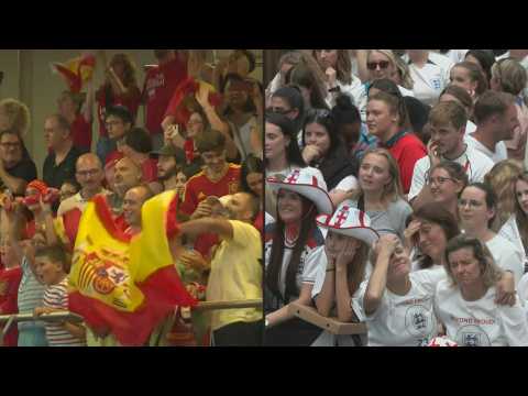 Spain fans celebrate World Cup win, England supporters downcast