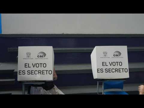 Ecuadorians cast their votes as polls open