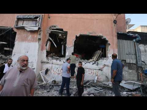 Palestinians inspect damage in West Bank camp after Israeli raid