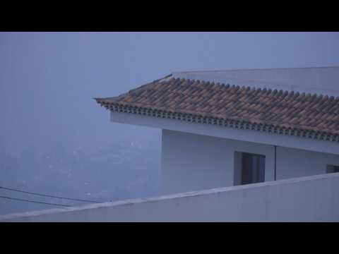 Dawn reveals cloud of smoke over Tenerife village