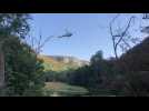 Incendie dans le massif du Semnoz : des hélicoptères prennent de l'eau dans le Chéran