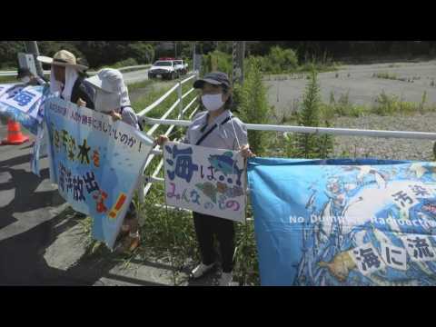Small protest near Fukushima power plant as water release is set to begin