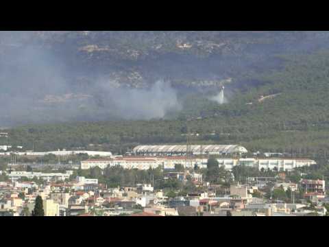 Firefighters battle blaze on Mount Parnitha near Athens