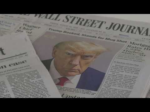 Trump's historic mug shot makes US front pages