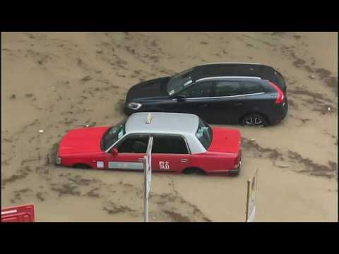 Heavy rainfall causes widespread flooding, cars submerged