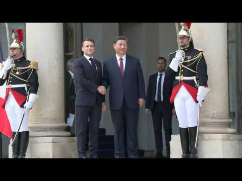 Chinese President Xi Jinping arrives at the Elysee