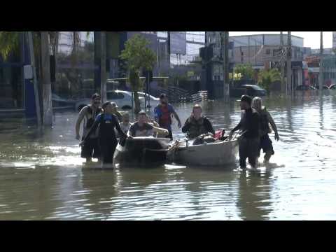 Brazil: Residents navigate Porto Alegre's flooded streets in boats