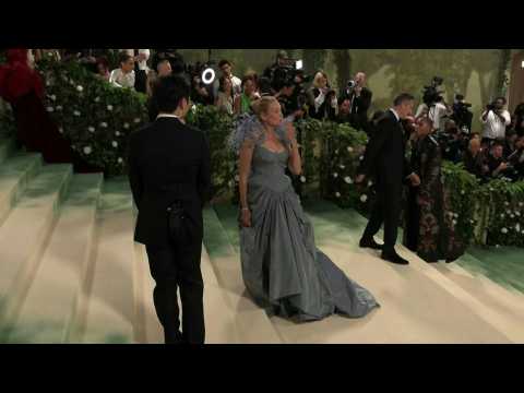 Actress Uma Thurman poses for photographs at Met Gala