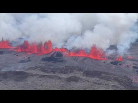 Aerial footage of ongoing volcanic eruption in Iceland