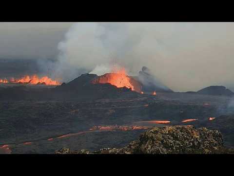Lava spews from volcanic eruption in southwestern Iceland