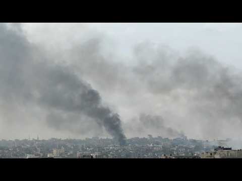 Columns of smoke rise over Rafah following strikes