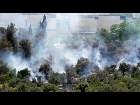 Firefighters extinguish fire near Israel Museum in Jerusalem