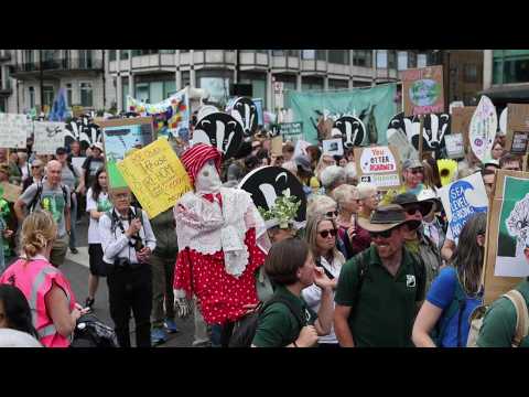 People in London take part in the "Restore Nature Now" protest, supported by XR and WWF