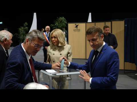 French President Emmanuel Macron casts his vote in the general elections