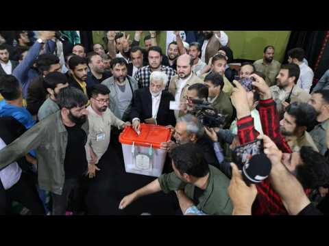 Presidential candidate Saeed Jalili votes in second round of Iranian election