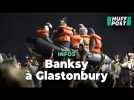 Banksy dénonce le sort des migrants en plein concert avec une performance