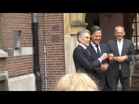Outgoing Dutch Prime Minister Rutte hands over power to his successor Schoof