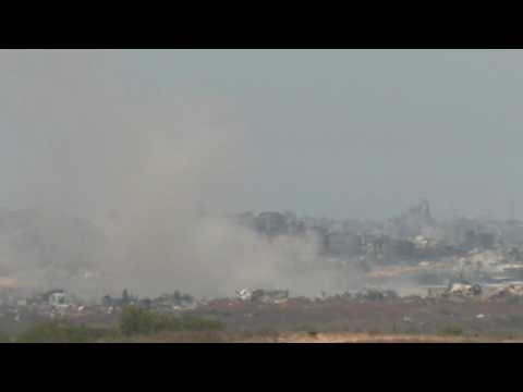 Smoke billows over northern Gaza as seen from Israel