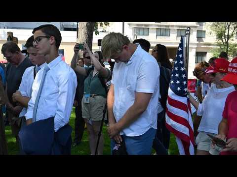 Trump supporters in Milwaukee pray for his health