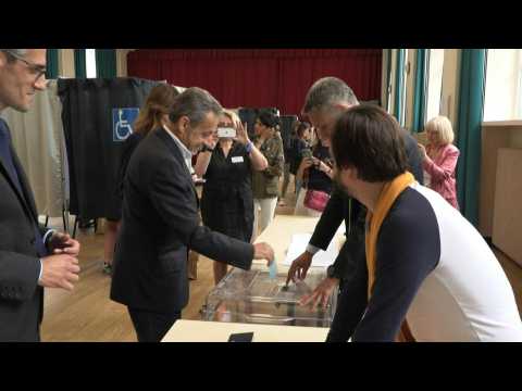 Former French president Sarkozy votes in Paris