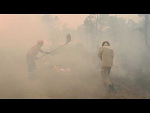 Firefighters battle wildfires in Brazil's wetlands, prompting state of emergency