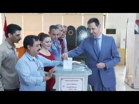 Syria's Assad casts his ballot in parliamentary poll