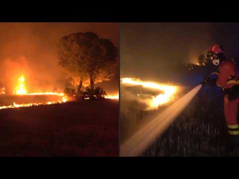 Firefighters battle huge blaze in Western Spain