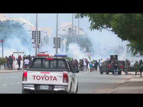 Nigeria police fire tear gas on hardship protests in capital Abuja