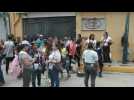 Families of arrested anti-government protesters gather outside Caracas detention center