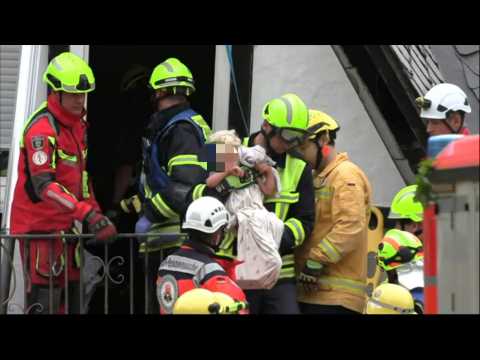 Emergency workers rescue three people from German hotel collapse