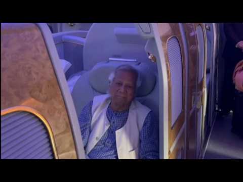 Images of Nobel laureate Muhammad Yunus on his flight to Bangladesh