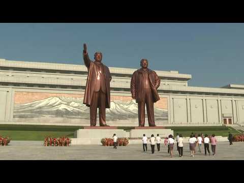 North Koreans lay flowers at Mansu Hill to mark Liberation Day