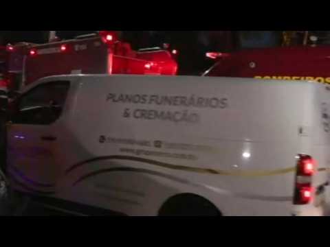 Funeral parlor vehicle arrives at scene of Brazil plane crash