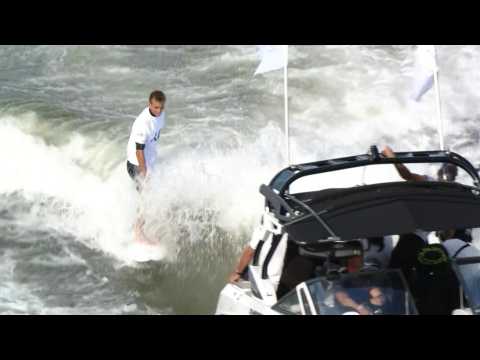 Gold medallist Kauli Vaast surfs along the Seine