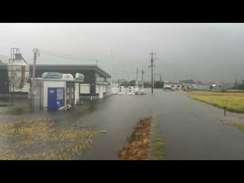 Torrential rain floods streets after Typhoon Shanshan hits Japan