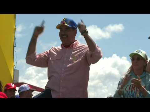 Venezuelan President Maduro dances on stage at rally ahead of vote