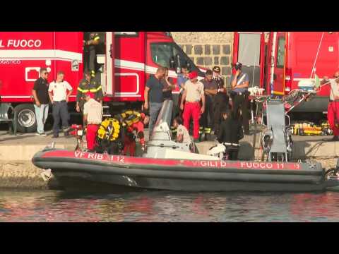 Italian emergency teams returning to shore amid rescue mission