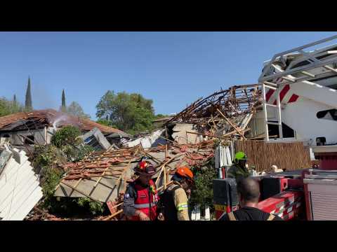 Firefighters at scene of rocket attack in Golan